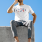 t-shirt-mockup-of-a-man-sitting-on-the-edge-of-a-roof-46604-r-el2