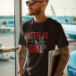 mockup-of-a-man-with-arm-tattoos-wearing-a-t-shirt-and-sunglasses-at-an-airport-m40558