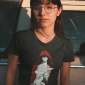 t-shirt-mockup-of-a-girl-with-round-glasses-19630