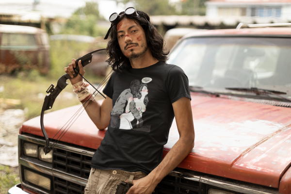 zombie-apocalypse-themed-t-shirt-mockup-featuring-a-man-posing-by-an-old-truck-m15765 zombie-apocalypse-themed-t-shirt-mockup-featuring-a-man-posing-by-an-old-truck-m15765