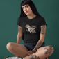 beautiful-edgy-girl-wearing-a-t-shirt-mockup-while-sitting-on-a-pink-studio-a17175