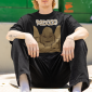 hip-hop-inspired-mockup-of-a-man-with-an-arm-tattoo-wearing-an-oversized-tee-m39247