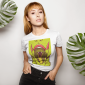 mockup-of-a-woman-wearing-a-t-shirt-against-a-background-with-big-leaves-18365