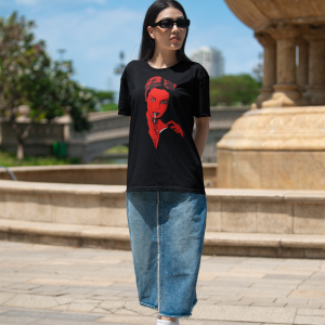 mockup-of-a-woman-wearing-an-oversized-bella-canvas-t-shirt-on-the-street-m40209