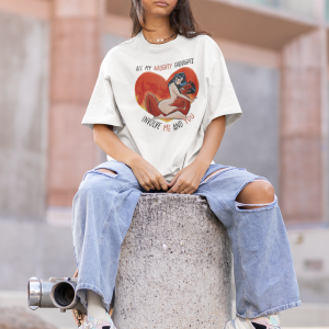 oversized-tee-mockup-of-a-young-woman-sitting-on-a-concrete-pillar-m25266