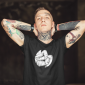 sublimated-t-shirt-mockup-of-a-young-man-with-multiple-tattoos-35244-r-el2