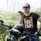 t-shirt-mockup-of-a-happy-tattooed-man-talking-on-the-phone-while-riding-a-motorbike-m16242-r-el2